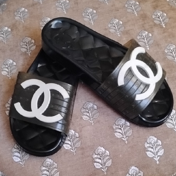 CHANEL Shoes - Authentic Chanel Women's Black and White Logo Slides
